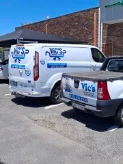 Branded Vic's Plumbing service vehicles